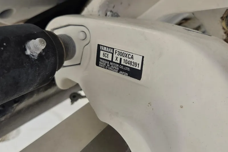 Slide: The Image of Close-up of Yamaha F300XCA engine label on 2010 Pursuit S 280 Sport boat. - 17