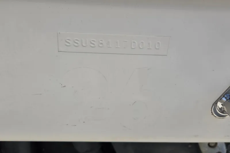 Slide: The Image of Hull identification number on 2010 Pursuit S 280 Sport boat. - 19