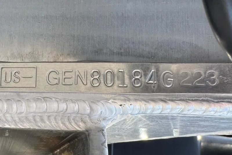 Slide: The Image of 2023 SunCatcher Elite 326 SE hull identification number close-up. - 33