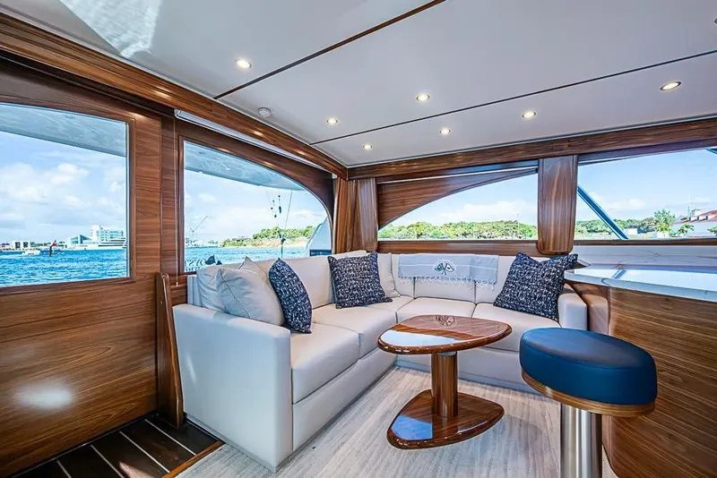 Slide: The Image of Luxurious interior of the 2026 Viking 54 Convertible yacht. - 31