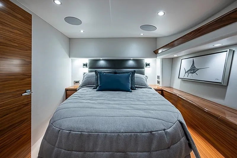 Slide: The Image of Luxurious bedroom in Viking 54 Convertible 2026 yacht model. - 42