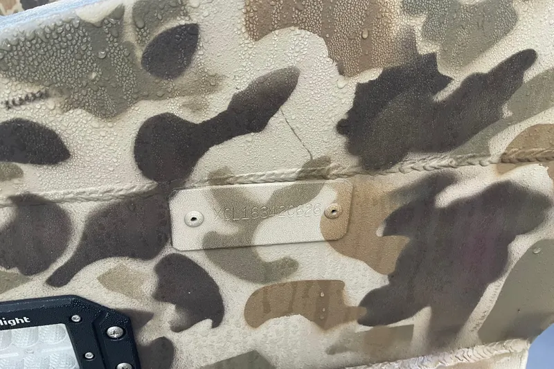Slide: The Image of Camouflage pattern on Excel 1751 Viper F4, 2026 model, with visible serial plate. - 5