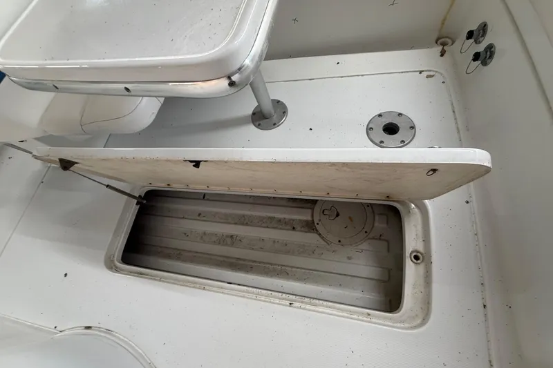 Slide: The Image of Open storage compartment on 2005 Formula 330 Sun Sport boat deck. - 45