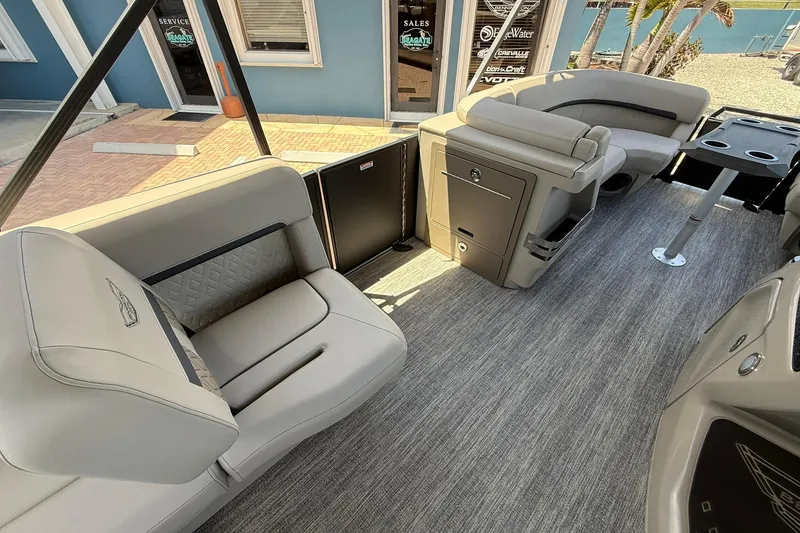 Slide: The Image of Interior of 2026 Bennington 22 M Swingback pontoon boat with luxurious seating and modern design. - 14
