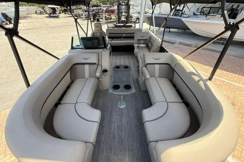 Slide: The Image of Luxurious interior of 2026 Bennington 22 M Swingback pontoon boat with plush seating. - 19