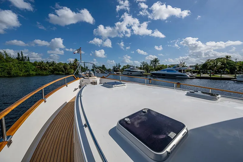 Slide: The Image of Grand Banks 42 Europa yacht deck view, 2002 model, cruising on a sunny day. - 17