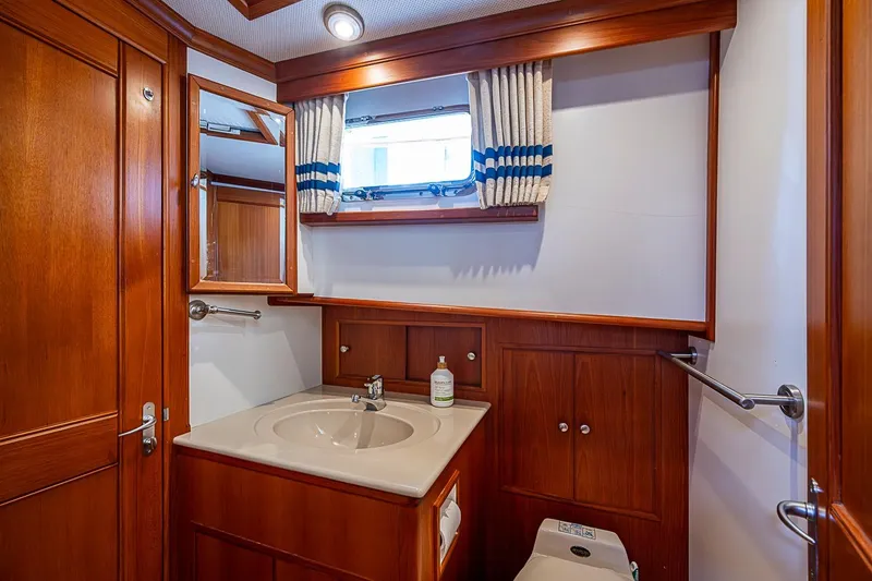 Slide: The Image of Luxurious wooden bathroom interior on 2002 Grand Banks 42 Europa yacht. - 51