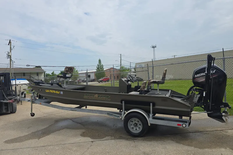 Slide: The Image of 2019 Gator Trax 18X54 boat on trailer with Mercury outboard motor. - 7