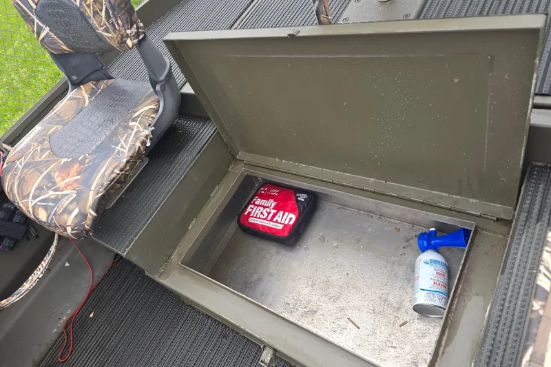 Slide: The Image of 2019 Gator Trax 18X54 boat storage with first aid kit and air horn. - 9