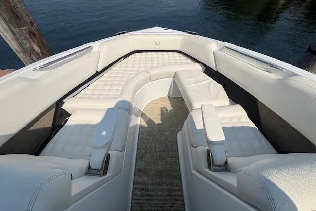 Slide: The Image of 2018 Cobalt R5 boat with luxurious white seating and spacious deck. - 20