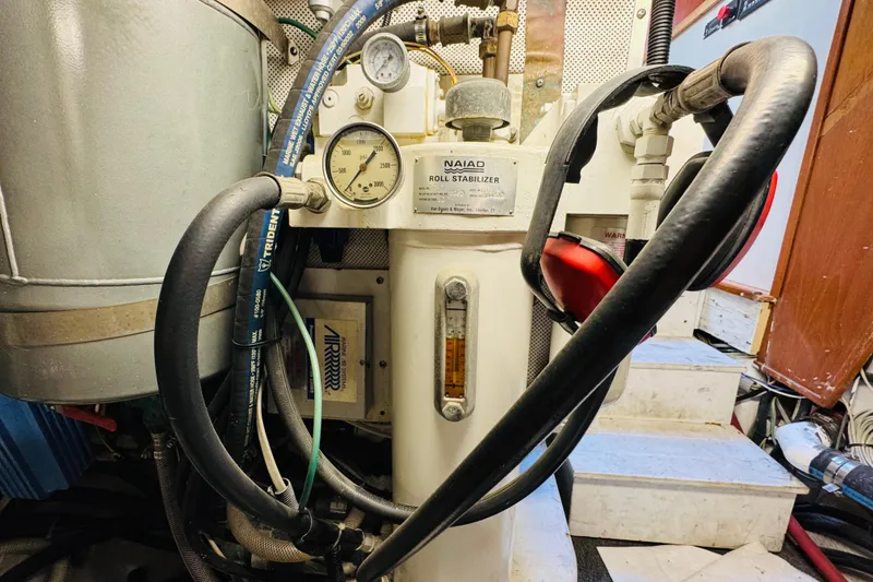Slide: The Image of Engine room of 1991 Californian 55 Cockpit Motor Yacht with Naiad roll stabilizer system. - 113