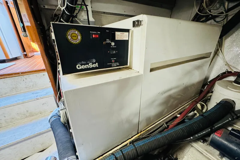 Slide: The Image of Engine room of 1991 Californian 55 Cockpit Motor Yacht with marine generator. - 114