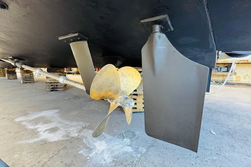 Slide: The Image of Propeller and rudder of 1991 Californian 55 Cockpit Motor Yacht on dry dock. - 120