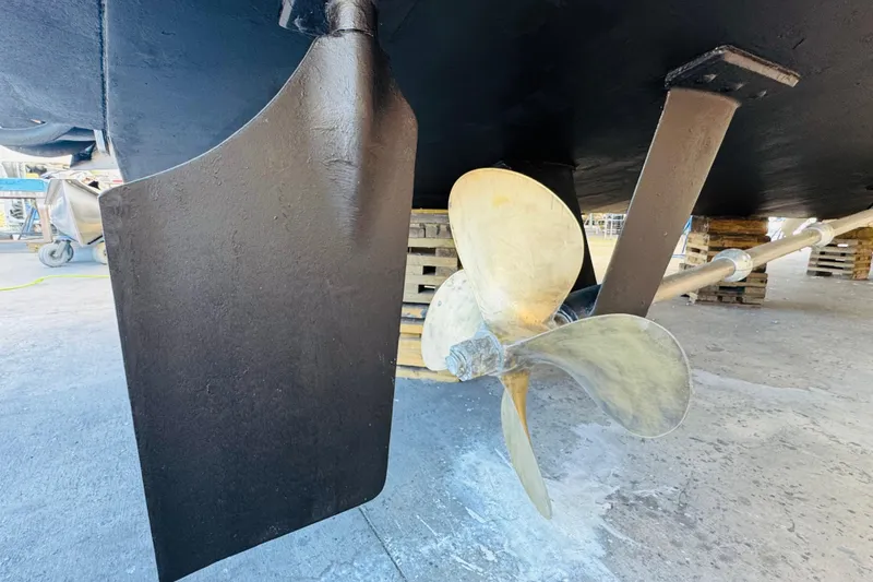 Slide: The Image of Propeller and rudder of 1991 Californian 55 Cockpit Motor Yacht on dry dock. - 121