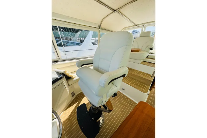 Slide: The Image of Luxurious cockpit seating on a 1991 Californian 55 Cockpit Motor Yacht. - 43