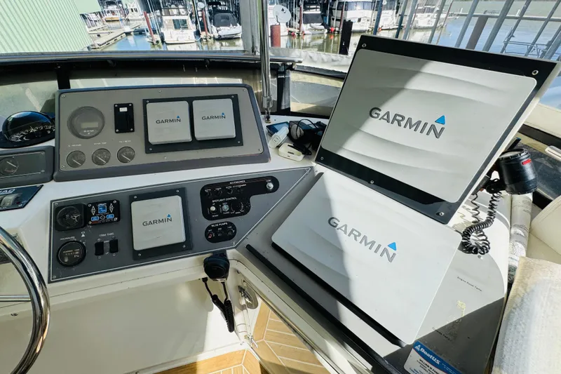 Slide: The Image of Cockpit of 1991 Californian 55 Motor Yacht with Garmin navigation systems. - 46