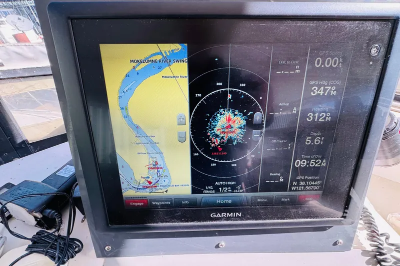Slide: The Image of Garmin navigation display on 1991 Californian 55 Cockpit Motor Yacht, showing Mokelumne River map. - 55
