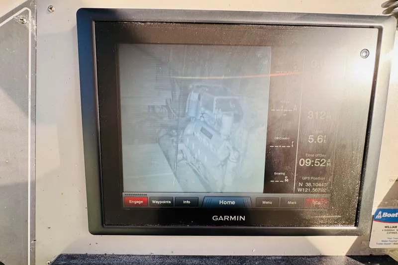 Slide: The Image of Garmin navigation display on 1991 Californian 55 Cockpit Motor Yacht showing engine data. - 57