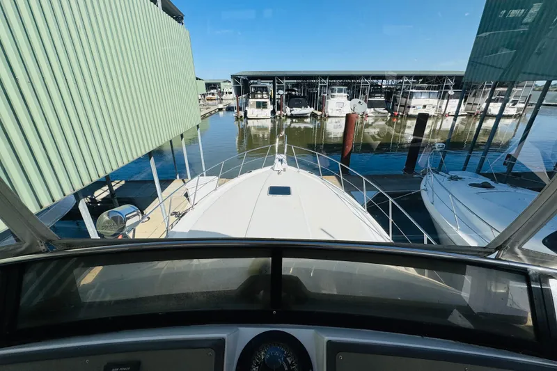 Slide: The Image of 1991 Californian 55 Cockpit Motor Yacht docked at marina, viewed from cockpit. - 66