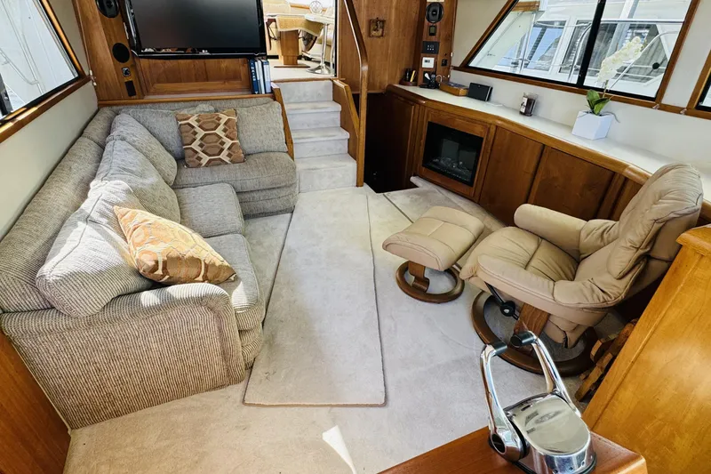 Slide: The Image of Luxurious interior of 1991 Californian 55 Cockpit Motor Yacht with plush seating and modern amenities. - 70