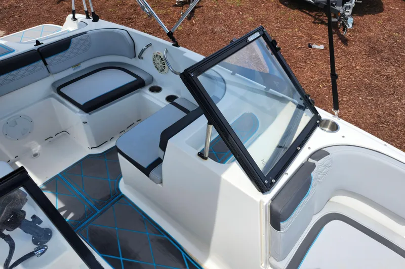 Slide: The Image of 2023 Bayliner Element M17 boat interior with seating and windshield. - 16