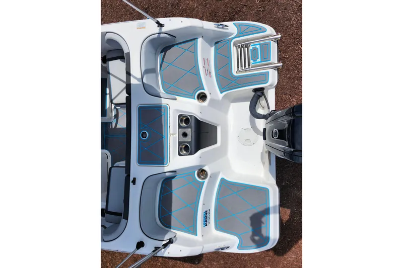 Slide: The Image of 2023 Bayliner Element M17 boat deck with seating and motor, top view. - 26