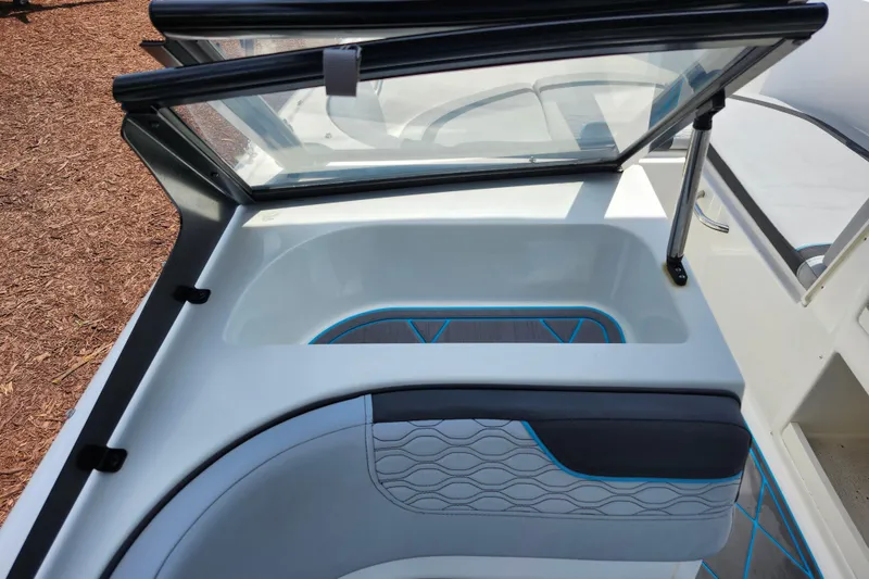 Slide: The Image of 2023 Bayliner Element M17 boat interior with open windshield and stylish seating. - 35