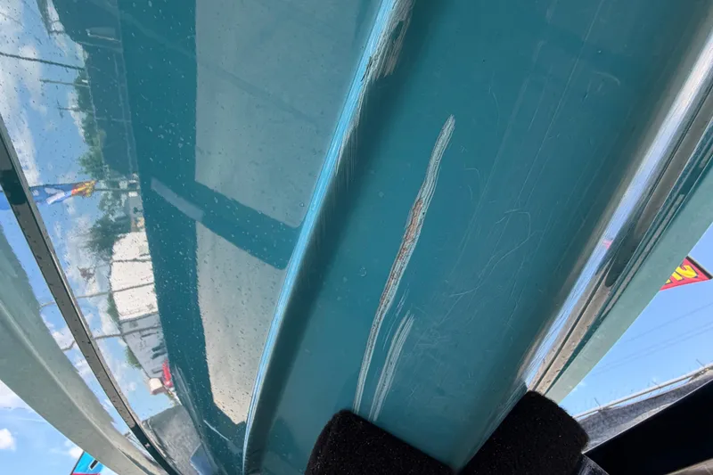 Slide: The Image of 2023 Heyday WTSurf boat with spacious seating and modern design in bright blue. - 15