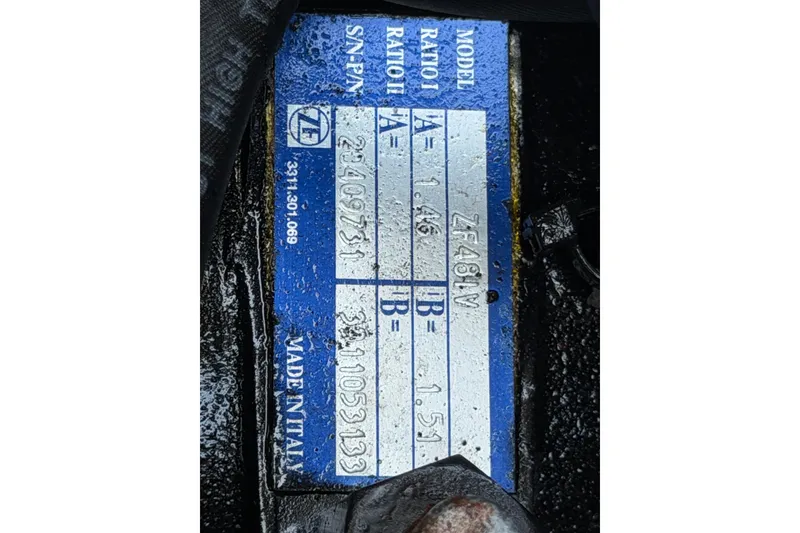 Slide: The Image of 2023 Heyday WTSurf boat interior with gray seating and blue accents. - 40