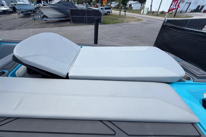 Slide: The Image of 2023 Heyday WTSurf boat deck with storage compartments and cup holders. - 45