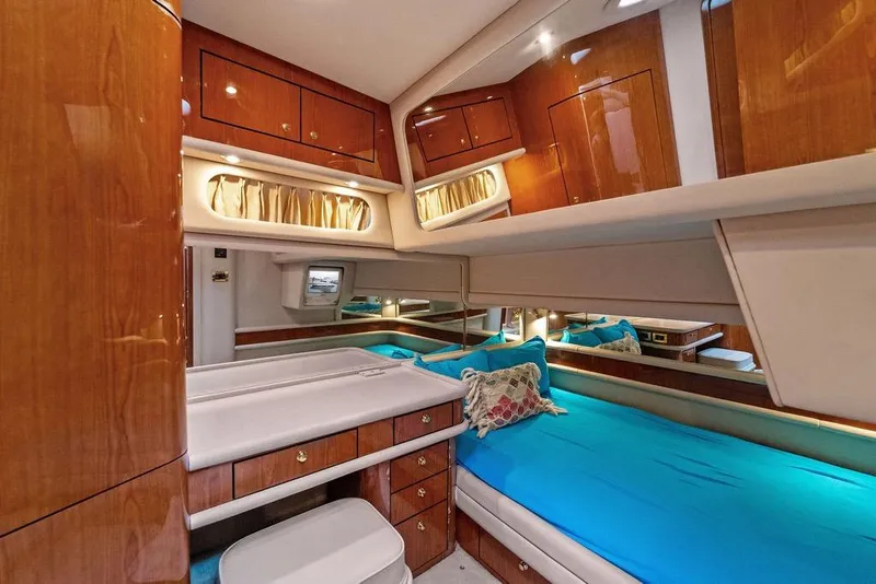 Slide: The Image of Luxurious cabin interior of 2000 Sea Ray 560 Sedan Bridge yacht. - 25