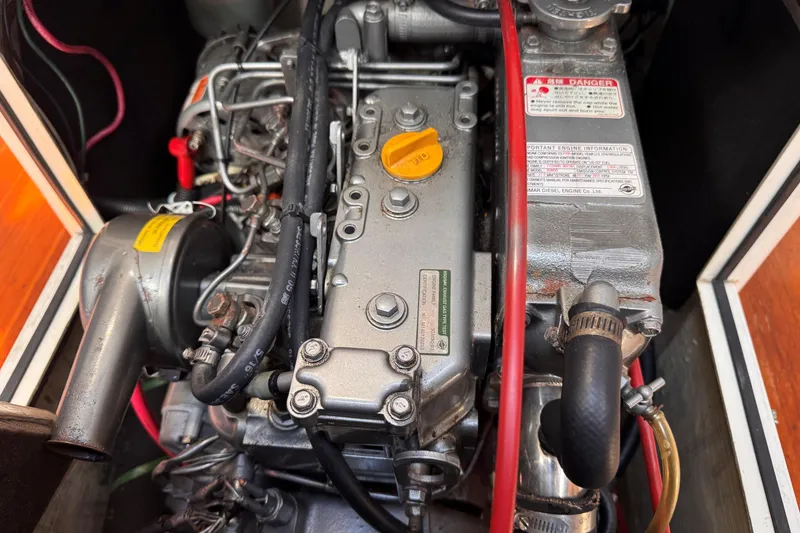 Slide: The Image of Engine compartment of a 2000 Sydney 38, showcasing detailed mechanical components. - 36