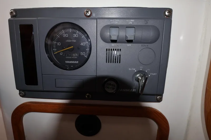 Slide: The Image of Control panel of a 2000 Sydney 38 yacht with Yanmar engine display. - 38