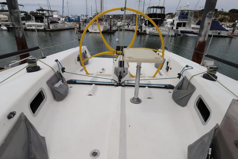 Slide: The Image of Cockpit of a 2000 Sydney 38 sailboat docked in a marina. - 9