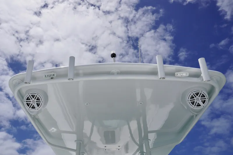 Slide: The Image of 2013 Contender 35 LS boat top view against a cloudy sky. - 23