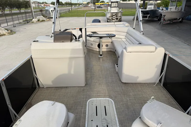 Slide: The Image of 2022 Custom G3 Suncatcher 322FC pontoon boat interior with seating and table. - 10