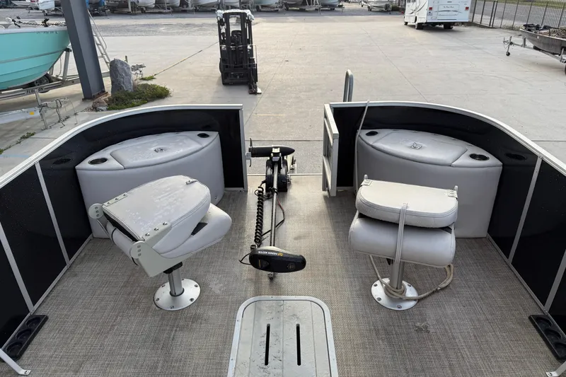 Slide: The Image of 2022 Custom G3 Suncatcher 322FC pontoon boat interior with seating and fishing equipment. - 15