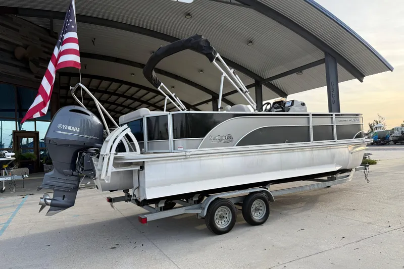Slide: The Image of 2022 Custom G3 Suncatcher 322FC pontoon boat with Yamaha motor and American flag. - 3