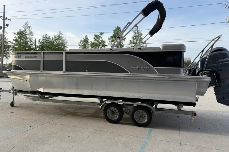 Slide: The Image of 2022 Custom G3 Suncatcher 322FC pontoon boat on trailer, side view. - 6