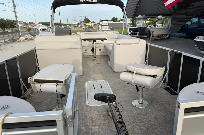 Slide: The Image of 2022 Custom G3 Suncatcher 322FC pontoon boat interior with seating and helm. - 9