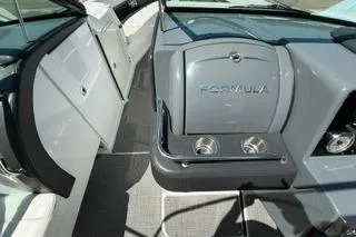 Slide: The Image of 2015 Formula 350 Crossover Bowrider interior with white seating and sleek design. - 19