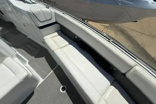 Slide: The Image of 2015 Formula 350 Crossover Bowrider cabin interior with folded blanket on bed. - 25