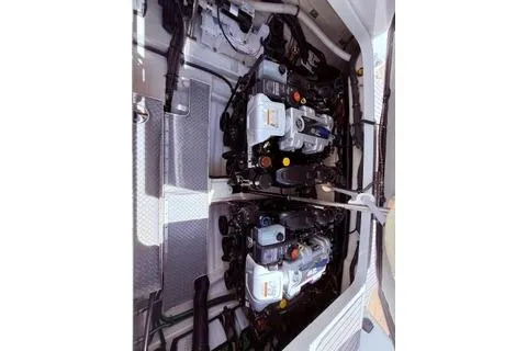 Slide: The Image of 2015 Formula 350 Crossover Bowrider deck with sleek, modern design and wood-like finish. - 35