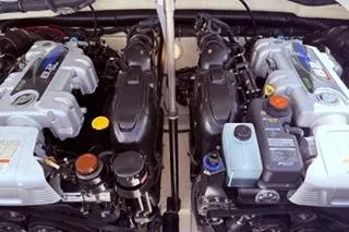 Slide: The Image of 2015 Formula 350 Crossover Bowrider boat on stands, featuring sleek design and vibrant colors. - 37