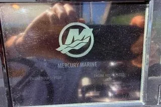 Slide: The Image of 2015 Formula 350 Crossover Bowrider boat side view with sleek design and vibrant colors. - 38