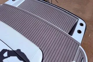 Slide: The Image of 2015 Formula 350 Crossover Bowrider boat with sleek black and white exterior. - 40