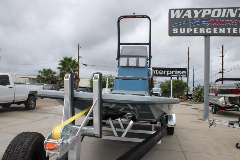 Slide: The Image of 2026 Freedom Boats 24 Defender on trailer at Waypoint Marine Supercenter. - 2