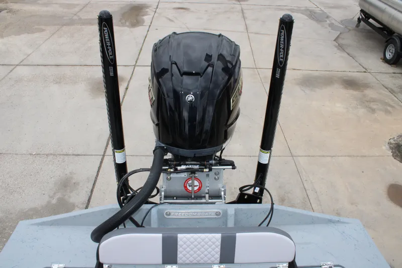 Slide: The Image of 2026 Freedom Boats 24 Defender with Power-Pole anchors and Yamaha outboard motor. - 20