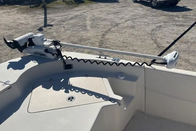 Slide: The Image of 2015 Carolina Skiff 198 DLV boat with trolling motor on deck. - 12