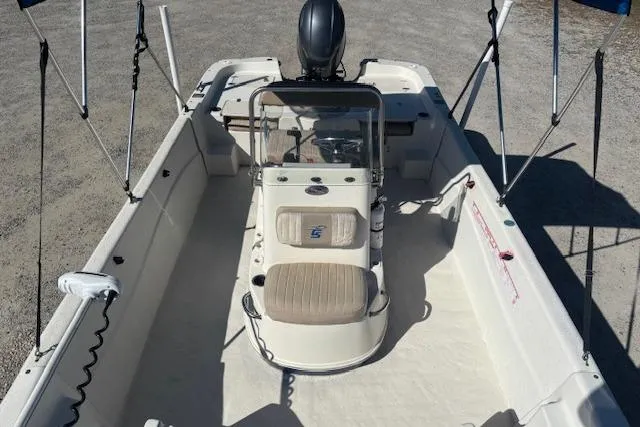 Slide: The Image of 2015 Carolina Skiff 198 DLV boat interior with seating and steering console. - 13